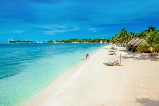 7 Mile Beach and Rick's Cafe in Negril from Montego Bay Private Tour - Seven Mile Beach: White Sand, Emerald Water, and Lounge-Chair Reality
