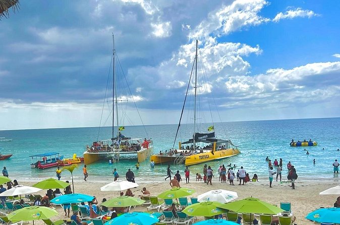 7 Mile Beach Party Catamaran Cruise with Snorkeling & Ricks Cafe - 7 Mile Beach in Negril, More Than Just a Name on a Postcard