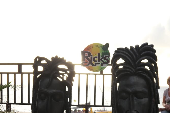 7 Mile Beach & Ricks Cafe with free Shopping experience - Rick’s Cafe: Cocktails, Cliff Jumpers, and Sunset Views