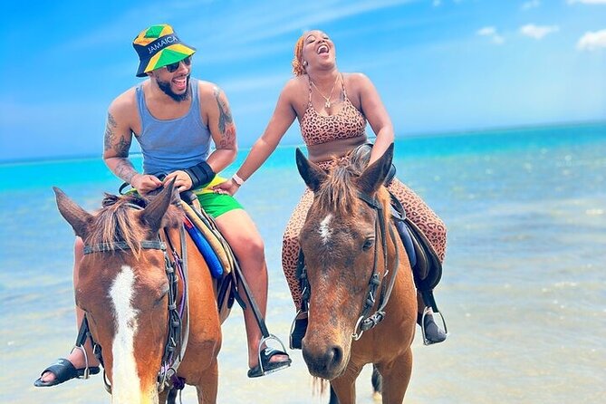 ATV, Zipline, Horseback, Bamboo Rafting & Catamaran Boat Jamaica - Catamaran party cruise: music, dancing, and a snorkel option