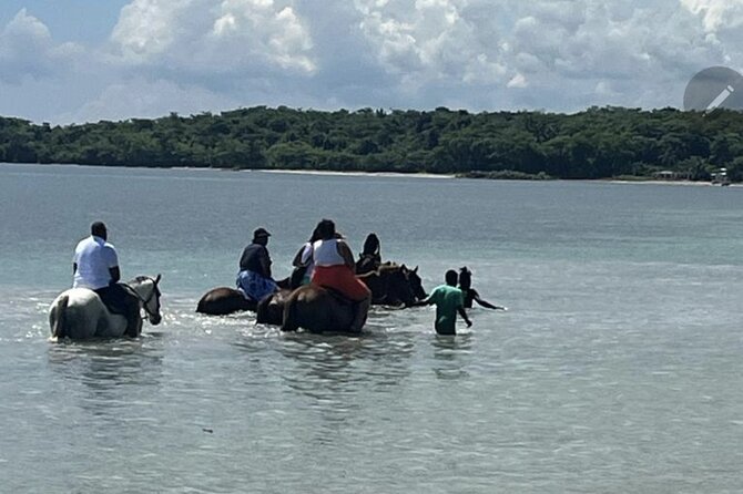 Bamboo Rafting and HorseBack Riding Excursion in OchoRios Jamaica - Stop 1 in Ocho Rios: The 60-Minute Bamboo River Raft on a 30ft Raft