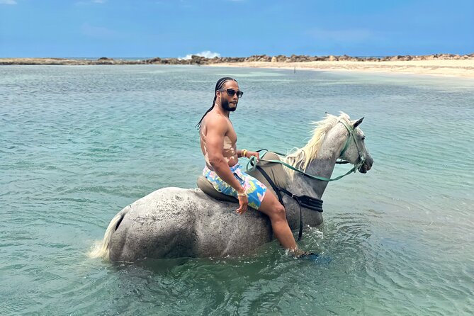 Bamboo Rafting & Horseback Ride n Swim Guided Tour in Montego Bay - Braco Stables Ride, Countryside Views, and the Private Beach Swim
