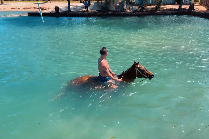 Bamboo Rafting & Horseback Ride n Swim Guided Tour in Montego Bay - A Quick Stop at Scotchies, Plus the Lunch Reality