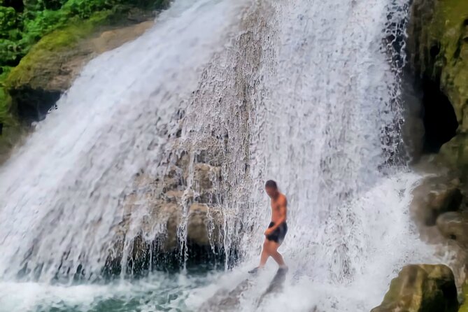 Blue Hole and Dunn's River Falls Ocho rios - Stop 2: Dunn’s River Falls Climb, Caves, and the White-Sand Finish