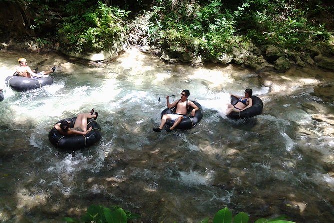 Blue Hole and River Tubing from Montego Bay - White River Tubing: A Real Guide, Inflatable Tubes, and Rope Swing Fun