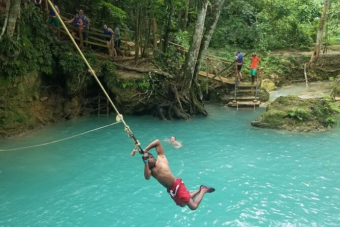 Blue Hole Falls with Horseback Ride Adventure from Montego Bay - St. Ann’s Bay horseback riding, trails, beach views, and water crossings
