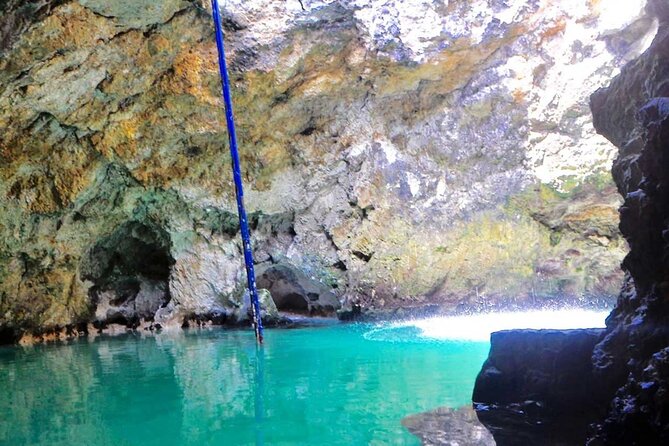 Blue Hole Mineral Spring and Rick's Cafe - Rick’s Cafe Negril: 35-foot cliff views and the sunset payoff