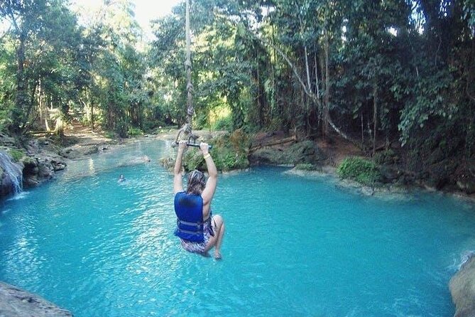 Blue Hole Secret Falls and River Tubing Tour - White River Tubing: Relaxing Currents with Class II Rapids