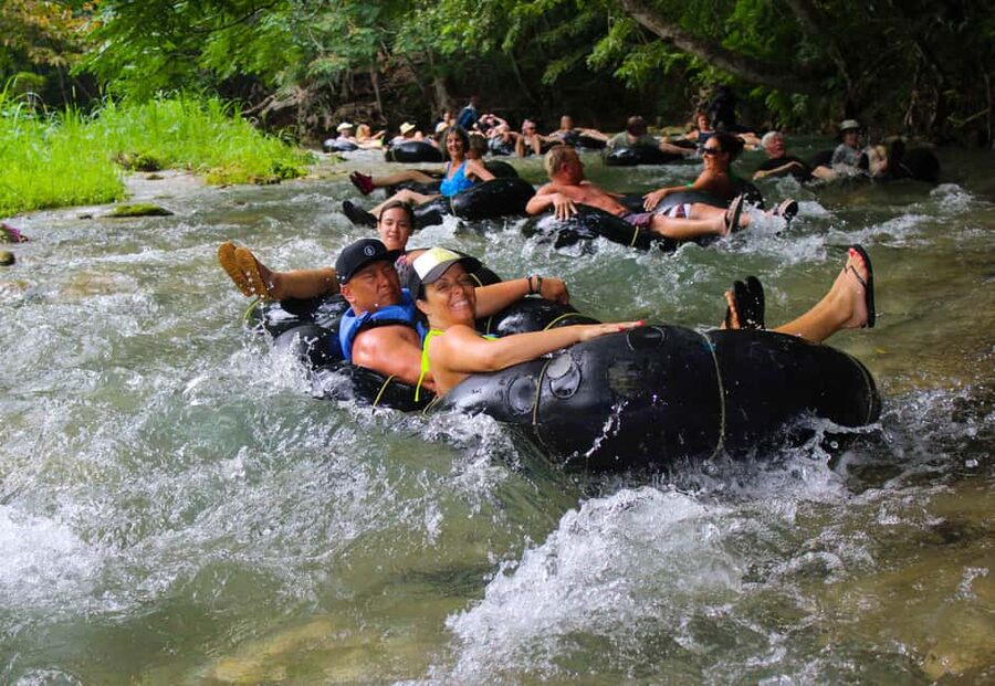 Blue Hole, Secret Falls, River Tubing and Dunn's River Falls - White River Tubing: Easy Rapids, Real Jamaica