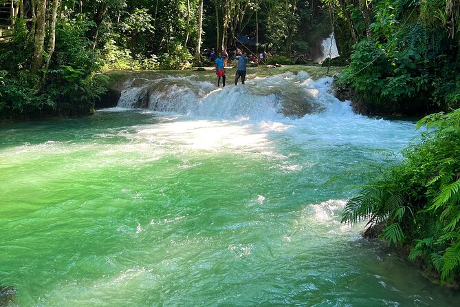 Blue Hole Waterfalls and Bamboo Rafting with Transportation - Value Check on the $139 Price