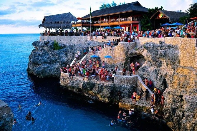 Catamaran Cruise Full Day Tour to Reef, Caves and Negril Beach - The Catamaran Cruise: Open Bar Reggae, Sun Deck Relaxing, and That Negril Vibe