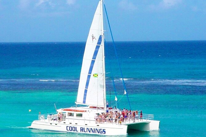 Catamaran Party Cruise and Snorkeling from Montego Bay - Margaritaville admission and the water slide plus inflatables