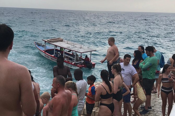 Cliff jumping and Sunsets - Inside Rick’s Cafe: cliff jumping, swimming, food, and photos