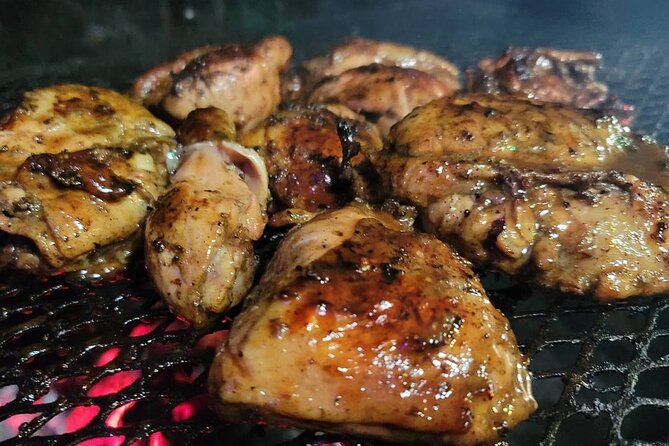 Dinner or Lunch with Pickup from Montego Bay - Choosing jerk chicken, pork, festival, and more