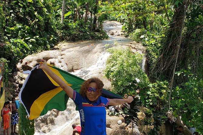 Dunn's Falls and Blue Hole Daytrip with Lunch from Montego Bay & Trelawny - Dunn’s River Falls and Park: the 600-ft climb with a guide leading the way