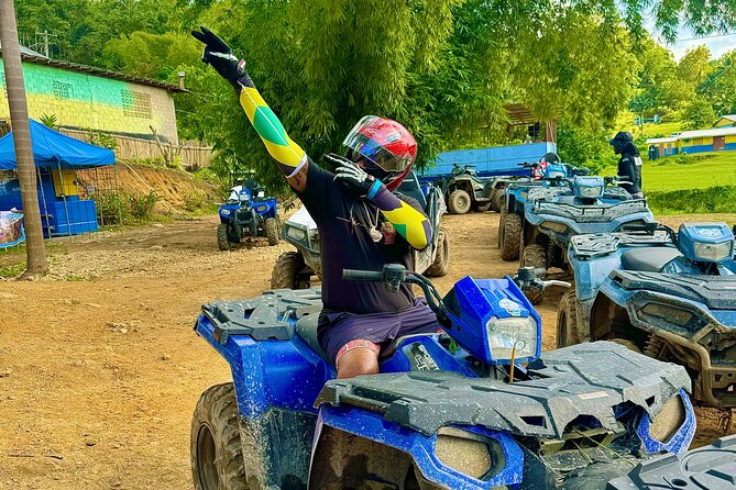 Dunn's River Falls , Bamboo Rafting & ATV Ride from Montego Bay - White River bamboo rafting: calm water and an optional limestone massage