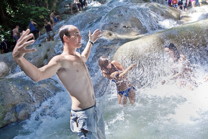 Dunn's River Falls & Luminous Lagoon Guided Tour from Montego Bay - Dunn’s River Falls: guided climbing, slick steps, and big views