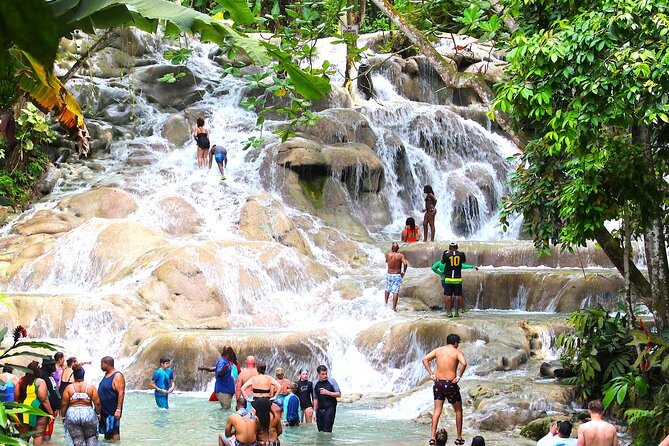 Dunn's River Park & Blue Hole Waterfall Combo from Montego Bay - Stop 1 at Blue Hole: rope swings, jump platforms, and limestone water