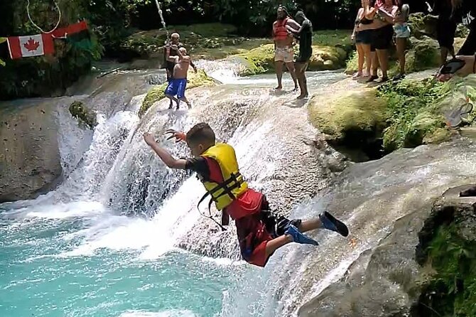 Dunns River Falls & Blue Hole Combo from Montego Bay with Pick Up - Blue Hole Action: Low Jump, Rope Swing, and Swimming