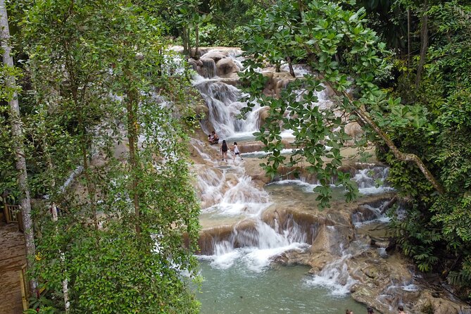 Dunns River Falls, Rafting, Zipline & Horseback from Montego Bay - Rafting the White River on a 30-Foot Bamboo Raft