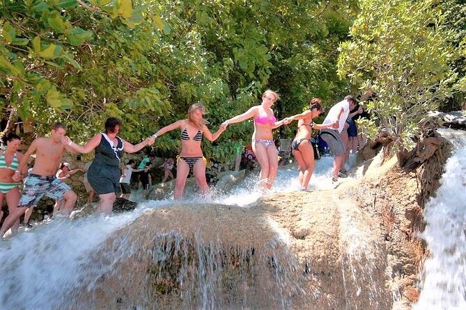 Exhilarating Dunn's River Falls Guided Tour from Ocho Rios hotels - Hotel Pickup and Driver-Guide: The Ride That Sets the Tone
