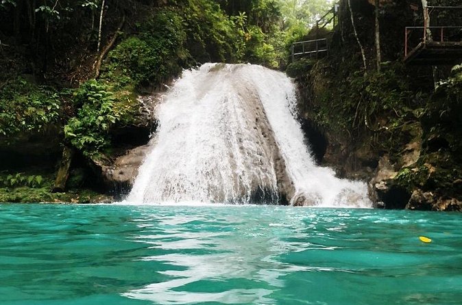 "Explore Scenic Tropical Waterfalls at Blue Hole" - Blue Hole itself: waterfall pools, cave exploration, and clay treatment