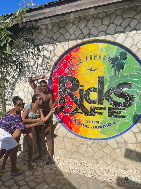 From Montego Bay: Negril Day Trip and Rick's Café Sunset - Rick’s Café at sunset: the cliffside show you came for