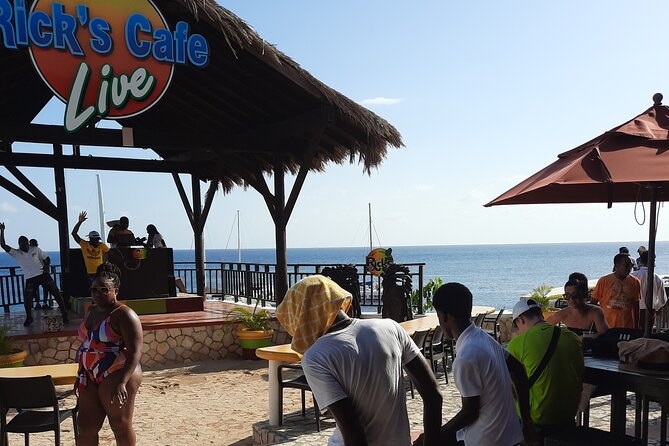 Full Day ATV, Ricks Café, Beach and Shopping Tour from Montego Bay - Rick’s Cafe in Negril: Bar Atmosphere and the Cliff Jump Option