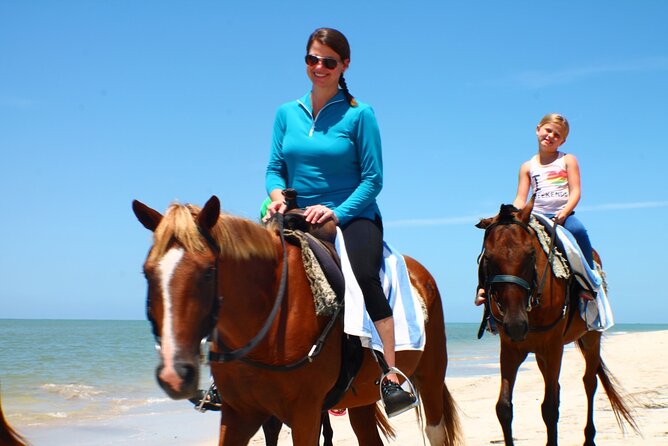 Horseback Ride ATV and Bamboo Rafting Tour Ocho Rios in Jamaica - Bamboo rafting on a 30-foot raft: rapids, wildlife, and river play