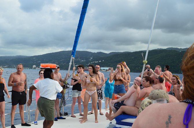 Jamaica Dunn's River Falls Party Cruise with Snorkeling - The Catamaran Experience: Music, Sights, and Open-Bar Energy