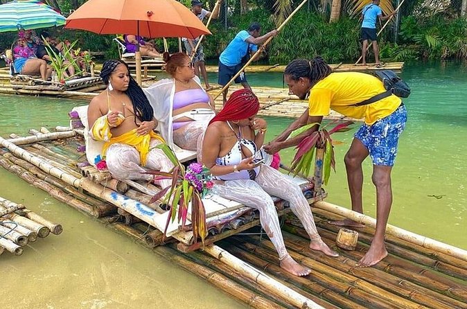 Martha Brae River Rafting And Luminous Lagoon Tour In Falmouth - Stop 1 at Martha Brae Rafting Village: Slow Jungle Water on a Bamboo Raft