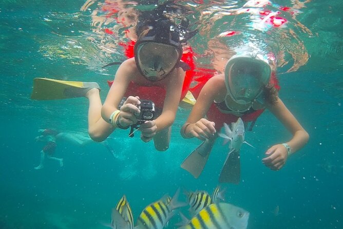 Montego Bay Catamaran: Snorkel Tour with Open Bar & Reggae DJ - Snorkeling in Montego Bay Marine Park: What You Get and How It Fits
