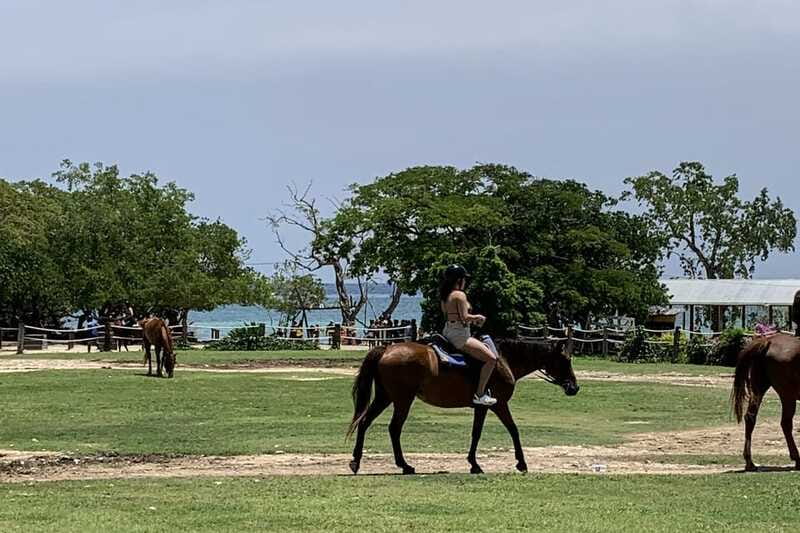 Montego Bay: Day Trip with Zipline, ATV, and Horseback Ride - Optional ocean time: catamaran party cruise and ocean bamboo rafting