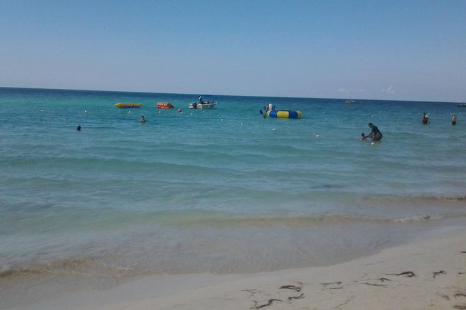 Montego Bay Excursion Negril 7 Miles Beach, Rick's Cafe and Time Square Shopping - Margaritaville In Negril: Lunch, Atmosphere, And Easy Family Fun