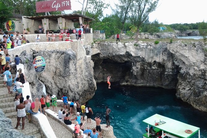 Montego Bay Excursion Negril 7 Miles Beach, Rick's Cafe and Time Square Shopping - Rick’s Cafe: Cliff-Jumping Energy And Jamaican Reggae