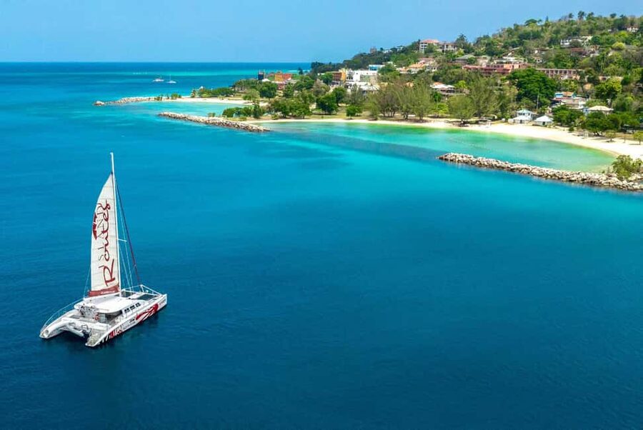 Montego Bay: Reggae Catamaran 18+ Cruise with Open Bar - The snorkeling stop: short swim, coral and fish