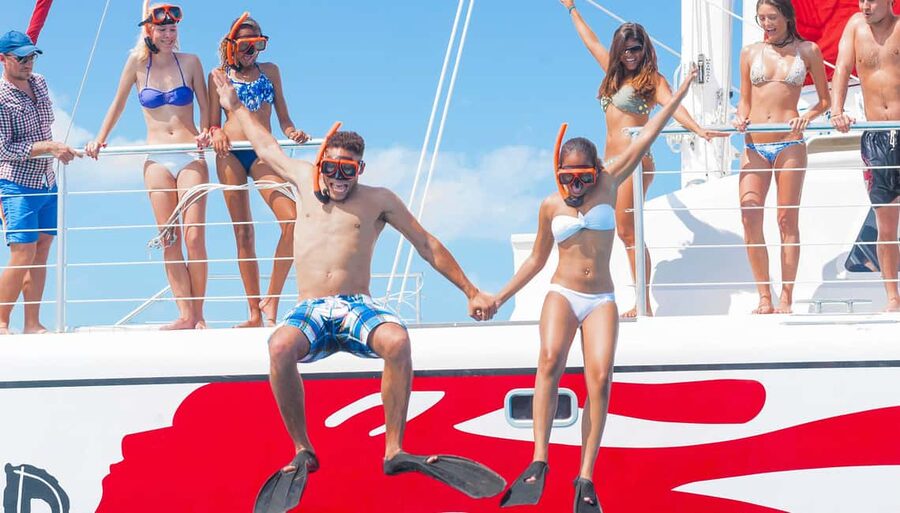 Montego Bay: Reggae Family Catamaran Cruise with Snorkeling - Cruise day on the catamaran: reggae, snacks, and open-water fun