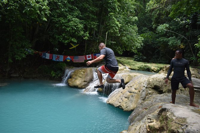 Montego Bay Shore Excursion: Blue Hole & Secret Falls Tour plus Shopping - Blue Hole time: swimming, jumps, and rope-play at Cool Blue Hole