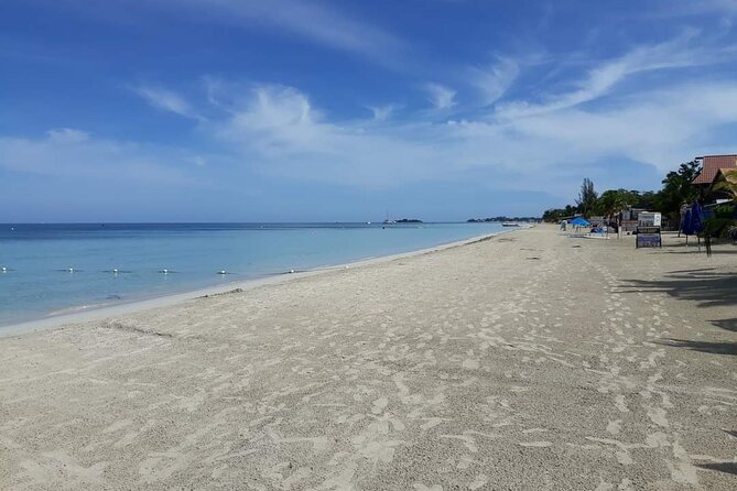 Negril 7 Miles Beach and Rick's Cafe Tour - Negril Day Trip Starts at the Hip Strip, With a Private Ride