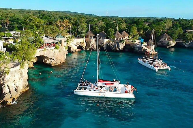 Negril Catamaran: Adults Sunset Party with Drinks & DJ - Rick’s Cafe: cliff divers, but expect a sea-condition twist