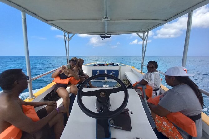 Negril Glass Bottom Boat Tour Snorkeling and Booby Cay - Booby Cay Island: what that island hour is like
