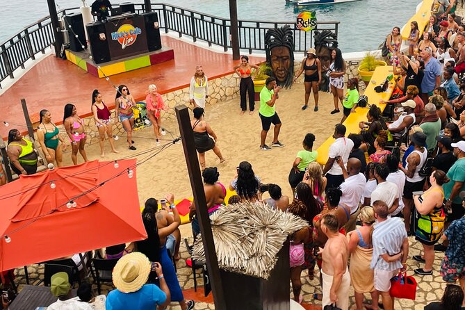 Negril Glass Bottom Boat Tour+Snorkeling visit Booby cay island - Seven Mile Beach intermission, then the Ricks Cafe finale