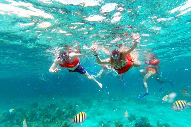 Negril PRIVATE CHARTER Catamaran (rate for 21 persons) - The 4-hour plan: reef snorkeling, Rick’s Cafe timing, and a sunset sail back