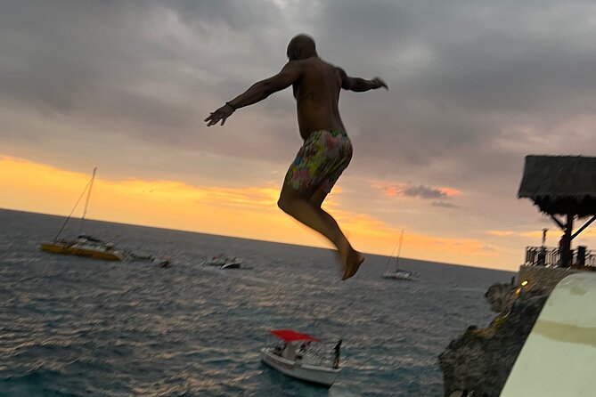 Negril Private Day Tour: ATV Ride, Party Catamaran & Ricks Cafe - A Full Negril Day Built Around Three Big Moments