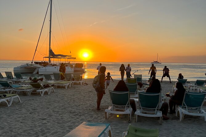 Negril Private Day Tour: ATV Ride, Party Catamaran & Ricks Cafe - Seven Mile Beach: Why This Stop Is More Than a Break