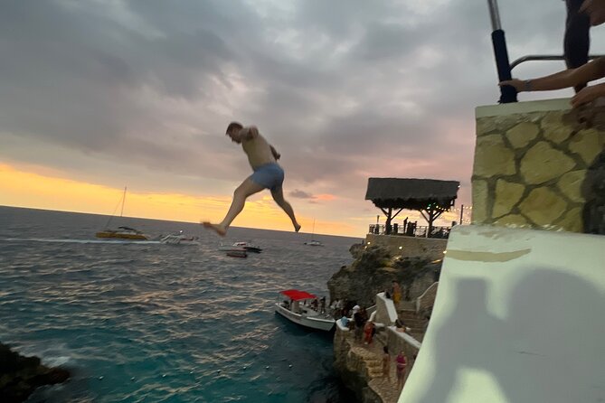 Negril Private Day Tour: ATV Ride, Party Catamaran & Ricks Cafe - Rick’s Cafe Sunset: Music, Food On Site, and the Cliff-Jump Option