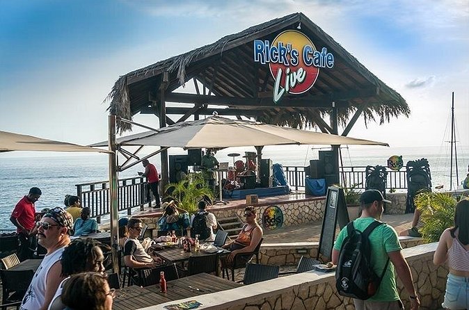 Negril's Private Day Trip with Margaritaville and Rick's Cafe - Stop 2: Rick’s Cafe, Music, Bar Food, and Optional Cliff Jumping
