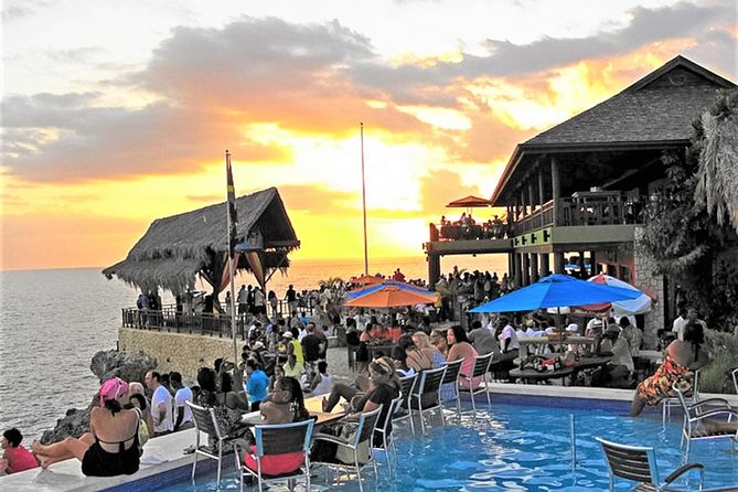 Negril Sunset Trip to Rick's Cafe from Montego Bay and Grand Palladium - Your Rick’s Cafe time: reggae, live entertainment, and the show on the edge