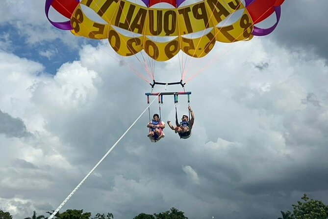 Negrils Seven Miles Beach, Rick's cafe and Parasailing Tour. - Rick’s Cafe cliff-jumping viewing: spectacle with a simpler payoff
