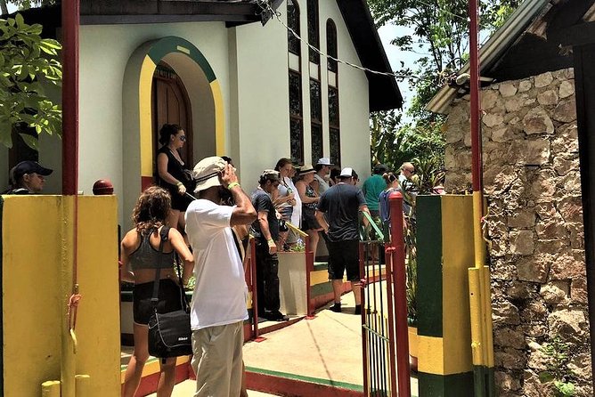 Nine Mile and Dunn's River Falls Day Trip from Montego Bay & Grand Palladium - Jerk lunch at Scotchies: a real Jamaican meal stop, not a snack break